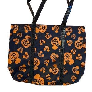 Authentic Halloween Disney tote with button closure.  NWT